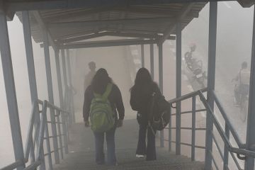 Image of students walking down stairs in the fog Image of students walking down stairs in the fog