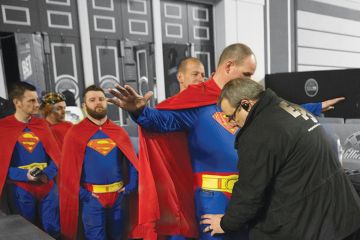 Fans wearing superman fancy dress are searched Fans wearing superman fancy dress are searched