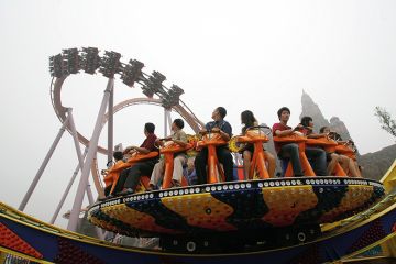 Tourists enjoy the amusement facilities at Chinese Theme Park, Beijing of China Tourists enjoy the amusement facilities at Chinese Theme Park, Beijing of China