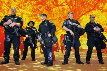 Police officers form a line on the edge of the UC Berkeley campus