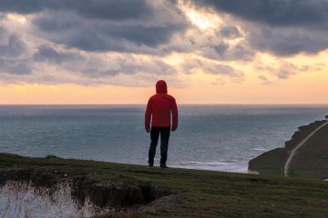 Person alone looking out to sea