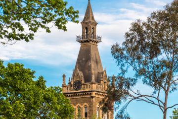 The clock tower of Ormond College at the University of Melbourne, Australia