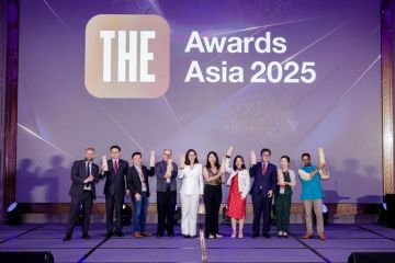 Asia award winners on stage at ceremony