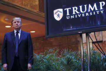 Donald Trump standing by a Trump University sign in New York City Donald Trump standing by a Trump University sign in New York City to illustrate Trump’s American Academy: pure politics, or valid idea?