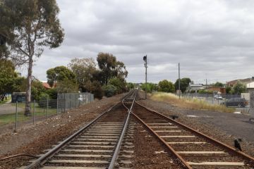 two train lines merging into one near the South Geelong train station two train lines merging into one near the South Geelong train station