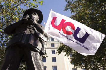 Rallies will take place across the UK during a two-day walkout by UCU members over pay University and College Union (UCU) flag hanging on statue