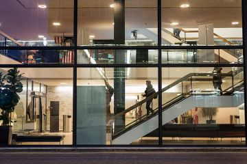 University of Sheffield campus at night. As an illustration that the benefits of working in academia, such as flexible hours, can also add to workload stress.