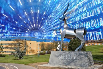 Stag sculpture at entrance to University of Surrey, Guildford, UK, with an artificial intelligence background. To illustrate the university introducing discipline-specific artificial intelligence (AI) into all of its courses. Stag sculpture at entrance to University of Surrey, Guildford, UK, with an artificial intelligence background. To illustrate the university introducing discipline-specific artificial intelligence (AI) into all of its courses.