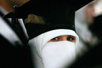 Veiled female student at graduation ceremony in Palestine Veiled female student at graduation ceremony in Palestine