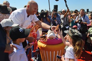 Celebrity chief Matt Moran cuts pieces of a giant cake of the Sydney Opera House as the world heritage-listed building celebrates its 40th birthday on October 20, 2013 Celebrity chief Matt Moran cuts pieces of a giant cake of the Sydney Opera House as the world heritage-listed building celebrates its 40th birthday on October 20, 2013
