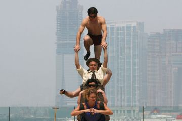 Circus Oz from Australia try to balance on each other Circus Oz from Australia try to balance on each other to illustrate Overseas earnings do not balance books, Australian v-cs say