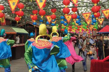 Dancers hanging banners