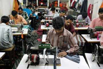 Textile workers in a small factory in old delhi india Textile workers in a small factory in old delhi india to illustrate PhD students protest against IIT’s ‘paper per semester’ rule