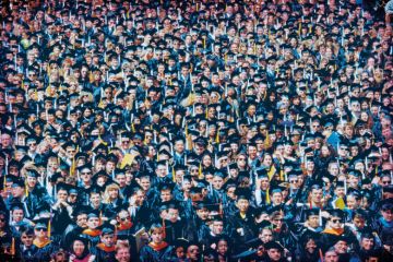 Crowd of graduates to illustrate Is Europe seeing the mass ification of the doctorate?