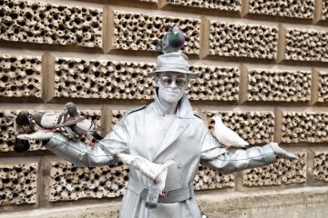 Metallic painted human statue Metallic painted human statue to illustrate ‘Record’ number of UK universities put pay rises on hold