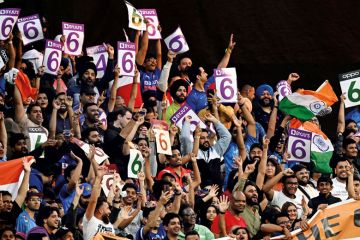 India fans cheer during the men's World Cup India fans cheer during the men's World Cup to illustrate IITs: Can the Indian premier league thrive on the international stage?