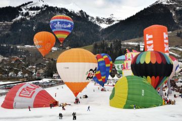 Hot air balloons take off in the Swiss Alps Hot air balloons take off in the Swiss Alps to illustrate Squeezed Swiss weigh EU alliances against global mobility