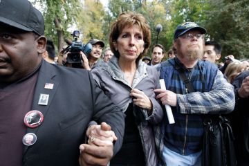 Linda Kateh is,escorted from the stage after she spoke during a rally on campus in Davis Linda Kateh is,escorted from the stage after she spoke during a rally on campus in Davis to illustrate Katehi: the political is not the personal