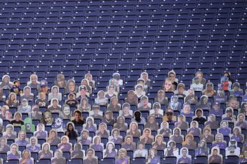 Empty stadium seats are seen with only card board cut outs of fans Empty stadium seats are seen with only card board cut outs of fans to illustrate The US has the scope to benefit greatly fro m overseas students