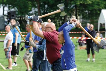 Players compete in the Nordic axe throwing championship in Maetaguse, Estonia, to illustrate Danish university admission cuts ‘endanger student mental health’
