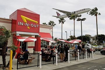 Qatar Airlines plane from Doha prepares to land at Los Angeles International Airport in Los Angeles to illustrate US colleges face ‘perfect storm’ on international recruitment