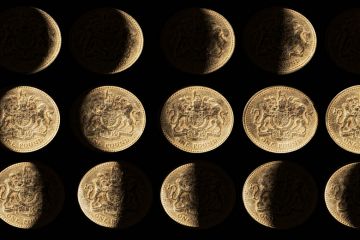 Rows of coins with gradual shadows to look like the moon as a metaphor for Is there a catch to the UK’s  promised £22bn for science