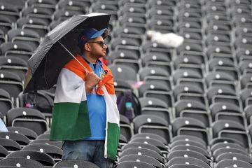 A fan shelters from the rain with an umbrella as play is delayed during the Semi-Final match of the ICC Cricket World Cup 2019 between India and New Zealand A fan shelters from the rain with an umbrella amongst empty seats as play is delayed during the Semi-Final match of the ICC Cricket World Cup 2019 between India and New Zealand to illustrate ‘Tough year’ for UK international student recruitment
