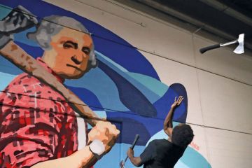 Axe Master Omar Cooper throws a hatchet backwards at a target in Washington, DC Axe Master Omar Cooper throws a hatchet backwards at a target in Washington, DC to illustrate National Science Foundation set for budget cut