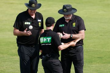 The umpires choose another ball at Lavington Sports Ground, Australia to illustrate Don’t pick sides in superpower rivalry, universities warned