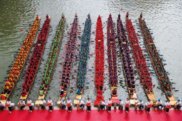 Participants compete during the Guangdong-Hong Kong-Macao Greater Bay Area Dragon Boat Competition to. illustrate Hong Kong nears first universities of applied sciences
