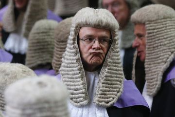 Judge showing an expression on his face Judge showing an expression on his face to illustrate courting controversy