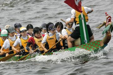 The Tokyo Madona women's team row in the Dragon Boat Race The Tokyo Madona women's team row in the Dragon Boat Race to illustrate Tokyo keen on overseas university branch campuses for Japan