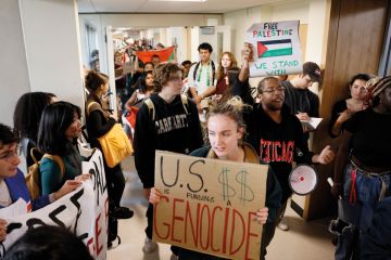 Students at University of Massachusetts Amherst enter the Whitmore Administrative Building to stage a sit in and present their demands to the Chancellor to end what they called, "UMass Amherst's ties with war profiteers and call for a ceasefire Students at University of Massachusetts Amherst stage a sit in and present their demands to the Chancellor to end what they called, "UMass Amherst's ties with war profiteers and call for a ceasefire