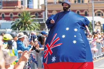  Man in inflated costume with an Australian flag to illustrate Some Australian campuses ‘earn more from locals than foreigners’