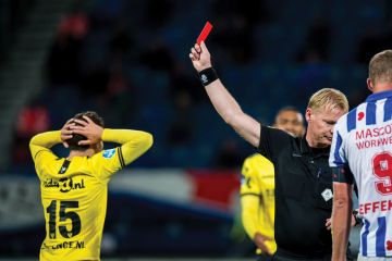 Referee  gives a red card  during the Dutch Eredivisie match 