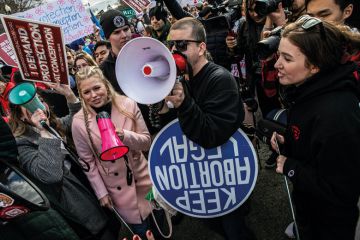 Abortion rights and anti-abortion rights demonstrators outside the Supreme Court to illustrate US universities test limits of abortion bans