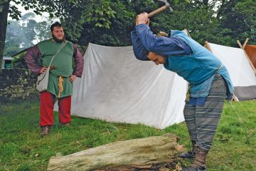 Members of the Barbarian camp chop firewood as the lives of Roman Legionnaires are re-enacted in the UK Members of the Barbarian camp chop firewood as the lives of Roman Legionnaires are re-enacted in the UK to illustrate More than 100 research posts at risk at Sheffield nuclear centre