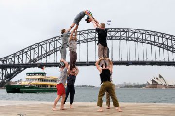 Acrobats as part of of circus, "Gravity and Other Myths" perform to illustrate Amid mergers, does size matter for Australian universities?