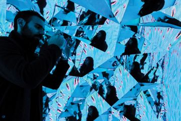 SYDNEY, AUSTRALIA - JUNE 06: A couple taking photos in an installation in the Samsung Galaxy Studio 