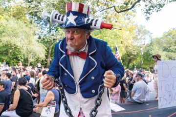 A man dressed as Uncle Sam takes part in a Republicans Rally against COVID vaccine mandates A man dressed as Uncle Sam takes part in a Republicans Rally against COVID vaccine mandates to illustrate Trump’s team may fuel anti-science fire