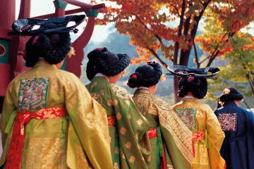Group of women at the Royal Silk Festival in Seoul to illustrate Korean women’s universities forced to review single-sex status