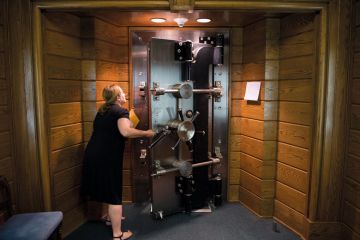 Person opens the library's vault located in the basement of the Folger Shakespeare Library, Washington Person opens the library's vault located in the basement of the Folger Shakespeare Library, Washington to illustrate US universities protest against research fraud transparency rules