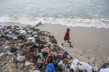 Piles of discarded textile waste on the shores of Chorkor beach in Accra, Ghana to illustrate Ashesi pivots to tackle new African challenges