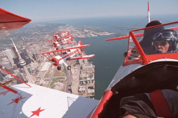 Group of pilots fly over Toronto to illustrate Canada wants foreign students to access all areas across the country