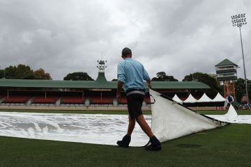 Ground staff cover pitch in Sydney, Australia to illustrate Option to bypass unions in workplace agreements  could close