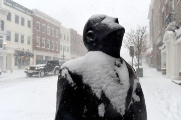 A snow covered sculpture is seen in Greenwich, Connecticut to illustrate Yale lawsuit signals US struggles on mental health exclusions