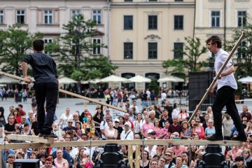Street performers in Krakow, Poland Street performers in Krakow, Poland to illustrate Polish academics ambivalent about Tusk government one year in