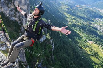 A man doing bungee jump from a cliff, Occitanie, Florac, France to illustrate French academics fear ‘grim’ funding situation ahead under Barnier
