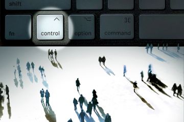 Concept image of a group of people around a control key on a computer Concept image of a group of people around a control key on a computer to illustrate Digital strategy can’t be left to CIOs; senior leaders must take ownership