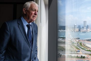 Chris Patten poses during an interview as mentioned in the article
